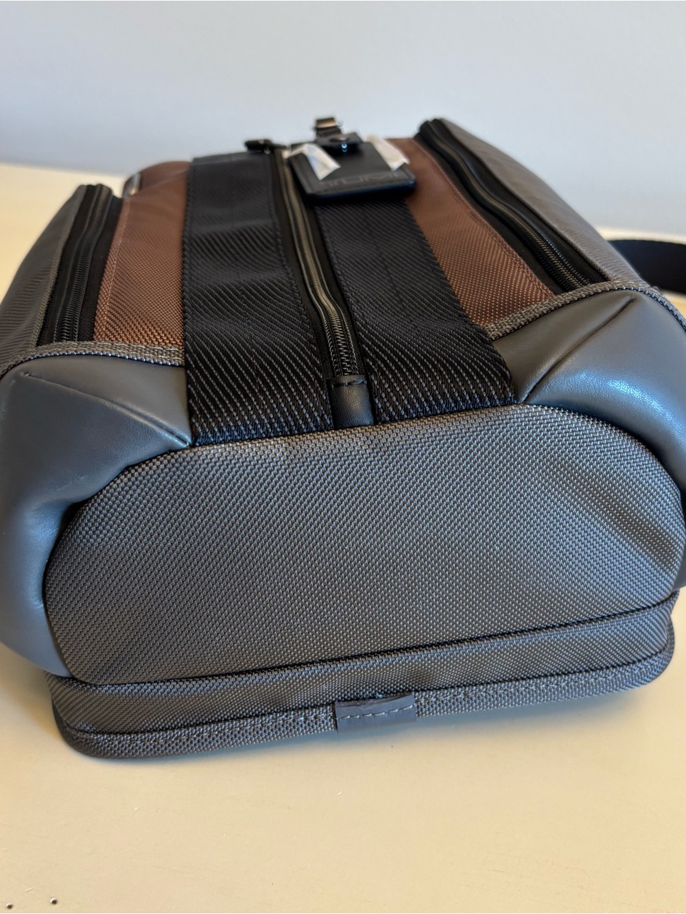TUMI Higgins men’s sling pack black brown colorblock multi bag NEW - Picture 9 of 12